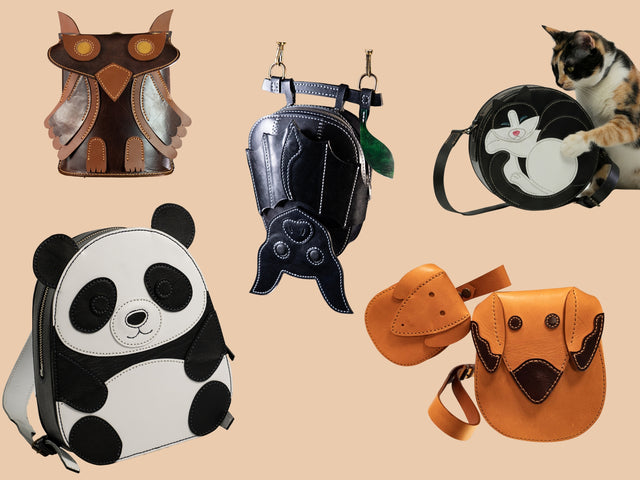 A collage of six unique animal-themed leather pouches and backpacks on a solid beige background, including an owl, bat, rabbit, panda, duck, and dog design. A calico cat is shown interacting with the cat bag in the top right.